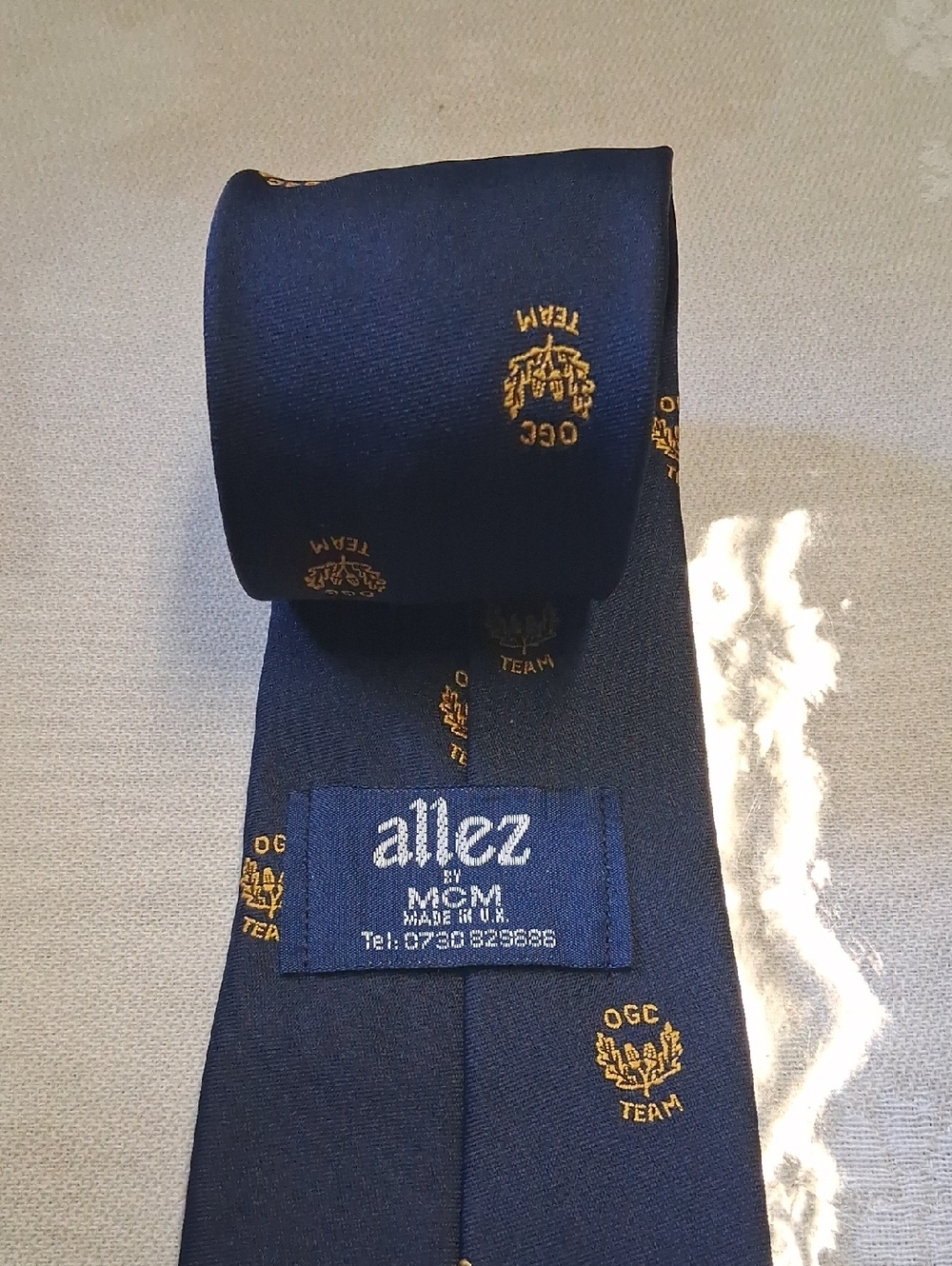 Navy Blue Men's Tie with Gold Crest